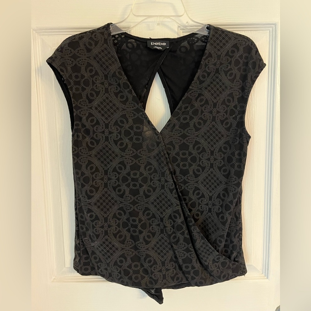Bebe sleeveless blouse